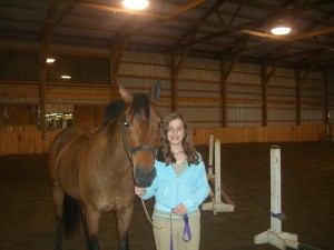 A happy girl and her pony